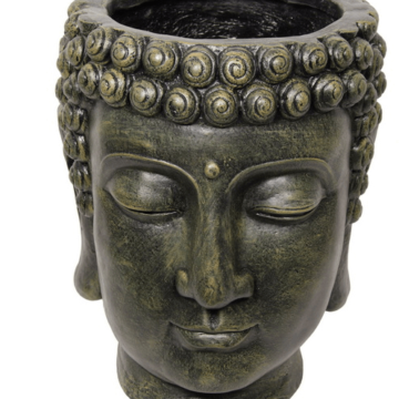 A large dark green buddha head statue, with a head opening for decoration placement