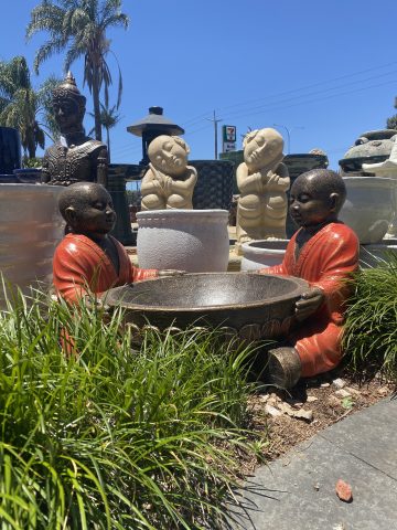 Twin Shaolin Monks Holding Bowl